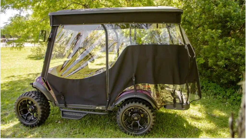 covered golf cart stored indoors for winter